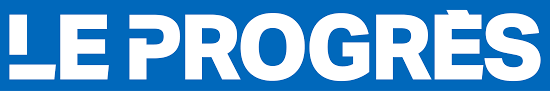 Close-up of a sign with the words 'LE PROGRÈS' in bold white letters on a blue background.